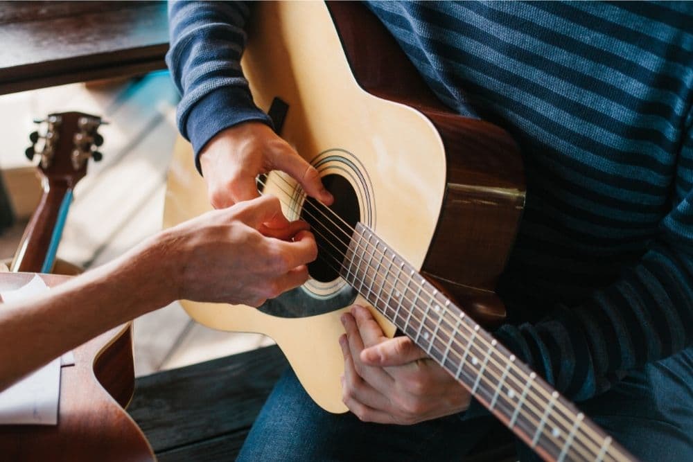 Are Guitar Lessons Worth It (Guitar Lessons Vs Teaching Yourself)