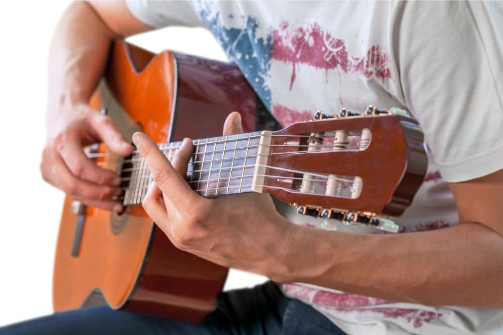 Is Fingerstyle Guitar Hard? (Is Fingerstyle Harder Than Strumming?)