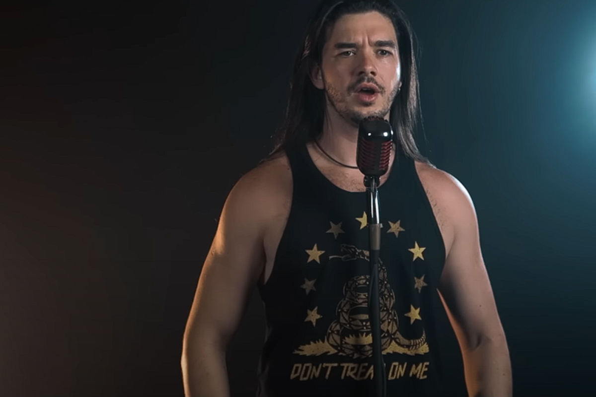 Dan Vasc singing into microphone