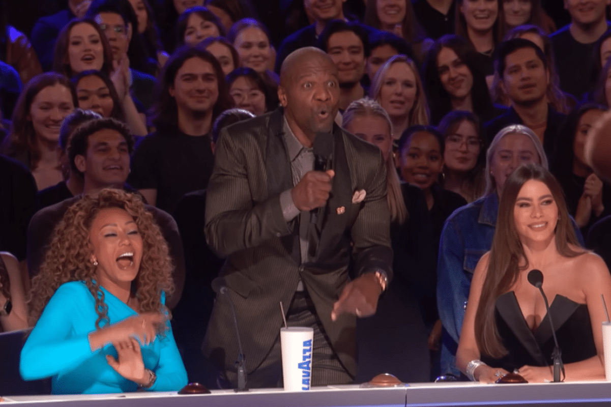Terry Cruz pressing the golden buzzer on AGT
